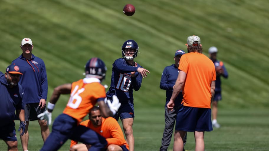 May 23, 2024; Englewood, CO, USA; Denver Broncos quarterback Bo Nix (10) passes to wide receiver Troy Franklin (16) during organized team activities at Centura Health Training Center. Mandatory Credit: Isaiah J. Downing-USA TODAY Sports | Isaiah J. Downing-USA TODAY Sports