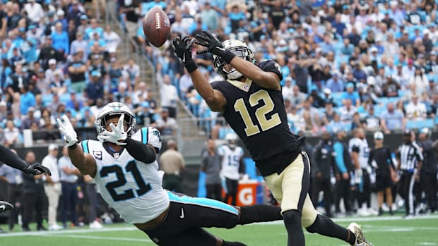 Sep 25, 2022; New Orleans Saints wide receiver Chris Olave (12) can't come up with a catch against the Carolina Panthers 