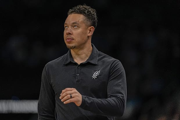 San Antonio Spurs interim coach Mitch Johnson during the second quarter against the Charlotte Hornets at Spectrum Center.