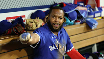 May 7, 2025; Anaheim, California, USA;  Toronto Blue Jays first baseman Vladimir Guerrero Jr. (27) reacts in the dugout after scoring a run during the sixth inning against the Los Angeles Angels at Angel Stadium. 