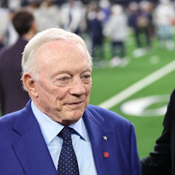 Nov 30, 2023; Arlington, Texas, USA; Colorado Buffaloes head coach Deion Sanders (right) talks with Dallas Cowboys owner Jerry Jones before the game against the Seattle Seahawks at AT&T Stadium. Mandatory Credit: Tim Heitman-Imagn Images