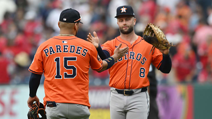 Jun 7, 2025; Cleveland, Ohio, USA; Houston Astros third baseman Isaac Paredes (15) celebrates with first baseman Christian Walker (8) after the Astros beat the Cleveland Guardians at Progressive Field. Mandatory Credit: Ken Blaze-Imagn Images