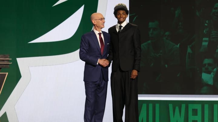 Jun 26, 2024; Brooklyn, NY, USA; AJ Johnson poses for photos with NBA commissioner Adam Silver after being selected in the first round by the Milwaukee Bucs in the 2024 NBA Draft at Barclays Center. Mandatory Credit: Brad Penner-USA TODAY Sports