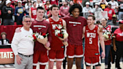 Mar 7, 2024; Pullman, Washington, USA; Washington State Cougars forward Andrej Jakimovski (23), Washington State Cougars forward AJ Rohosy (15), Washington State Cougars forward Isaac Jones (13) and Washington State Cougars guard Ben Olesen (5) pose with Washington State Cougars head coach Kyle Smith before a game against the Washington Huskies at Friel Court at Beasley Coliseum. Mandatory Credit: James Snook-Imagn Images