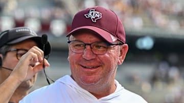Oct 5, 2024; College Station, Texas, USA; Texas A&M Aggies head coach Mike Elko gets ready for a pre-game interview with the SEC Nation prior to the game against the Missouri Tigers at Kyle Field. Mandatory Credit: Maria Lysaker-Imagn Images. 
