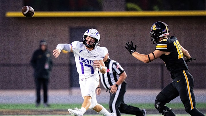 No. 1 Iowa City Liberty fell to No. 8 Johnston 24-27 in an upset on Friday night. 