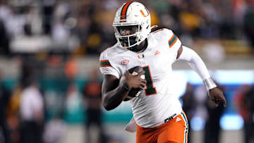 Oct 5, 2024; Berkeley, California, USA; Miami Hurricanes quarterback Cam Ward (1) rushes for a touchdown /across the/ during the fourth quarter at California Memorial Stadium. Mandatory Credit: Darren Yamashita-Imagn Images