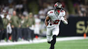 Oct 26, 2025; New Orleans, Louisiana, USA; Tampa Bay Buccaneers wide receiver Emeka Egbuka (2) runs for a gain during the first quarter against the New Orleans Saints at Caesars Superdome. 