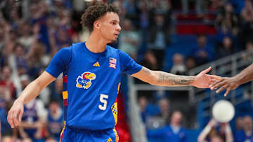 Feb 11, 2025; Lawrence, Kansas, USA; Kansas Jayhawks guard Zeke Mayo (5) celebrates after a score against the Colorado Buffaloes during the second half at Allen Fieldhouse. Mandatory Credit: Denny Medley-Imagn Images