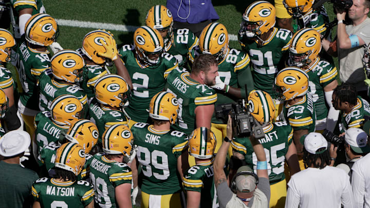 Green Bay Packers center Josh Myers (71) talks to his teammates before their game against the Indianapolis Colts on Sunday.