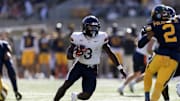 Nov 1, 2025; Berkeley, California, USA; Virginia Cavaliers running back J'Mari Taylor (3) breaks a big gainer against the California Golden Bears during the second quarter at California Memorial Stadium. Mandatory Credit: D. Ross Cameron-Imagn Images