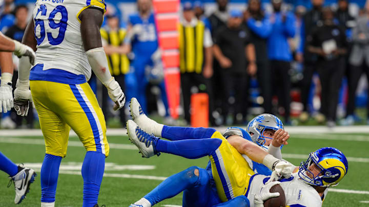 Detroit Lions defensive end Aidan Hutchinson (97) sacks Los Angeles Rams quarterback Matthew Stafford (9) during the second half of the Detroit Lions season opener against the Los Angeles Rams at Ford Field in Detroit, on Sunday, Sept. 8. 2024.