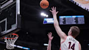 Mar 21, 2024; Salt Lake City, UT, USA;  Arizona Wildcats center Motiejus Krivas (14) shoots the ball against Long Beach State 49ers during the second half in the first round of the 2024 NCAA Tournament at Vivint Smart Home Arena-Delta Center.