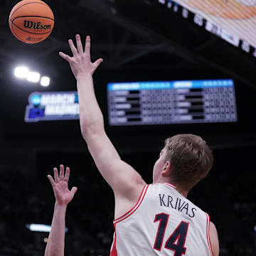 Mar 21, 2024; Salt Lake City, UT, USA;  Arizona Wildcats center Motiejus Krivas (14) shoots the ball against Long Beach State 49ers during the second half in the first round of the 2024 NCAA Tournament at Vivint Smart Home Arena-Delta Center.