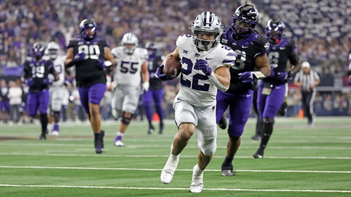 Dec 3, 2022; Arlington, TX, USA;  Kansas State Wildcats running back Deuce Vaughn (22) runs for a touchdown during the second half against the TCU Horned Frogs at AT&T Stadium. Mandatory Credit: Kevin Jairaj-USA TODAY Sports