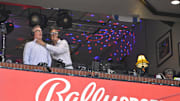 Jul 29, 2024; St. Louis, Missouri, USA;  Bally Sports broadcaster Chip Caray jokes around with broadcaster Joe Buck during the third inning of a game between the St. Louis Cardinals and the Texas Rangers at Busch Stadium. 