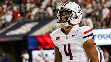 Aug 31, 2024; Tucson, Arizona, USA; Arizona Wildcats wide receiver Tetairoa McMillan (4) looks at scoreboard during third quarter at Arizona Stadium. Mandatory Credit: Aryanna Frank-Imagn Images