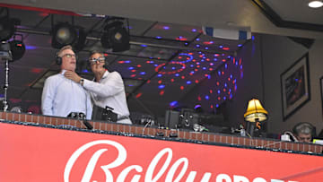 Jul 29, 2024; St. Louis, Missouri, USA;  Bally Sports broadcaster Chip Caray jokes around with broadcaster Joe Buck during the third inning of a game between the St. Louis Cardinals and the Texas Rangers at Busch Stadium. 
