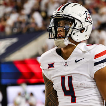 Aug 31, 2024; Tucson, Arizona, USA; Arizona Wildcats wide receiver Tetairoa McMillan (4) looks at scoreboard during third quarter at Arizona Stadium. Mandatory Credit: Aryanna Frank-Imagn Images