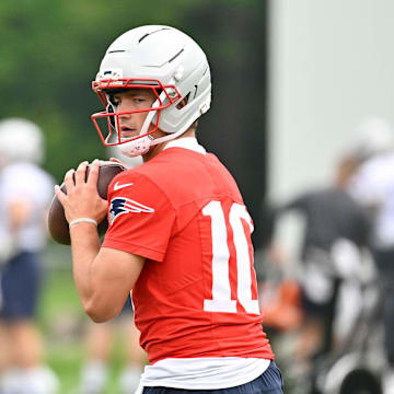 Jun 9, 2025; Foxborough, MA, USA; New England Patriots quarterback Drake Maye (10) looks to pass the ball during minicamp at Gillette Stadium. Mandatory Credit: Eric Canha-Imagn Images