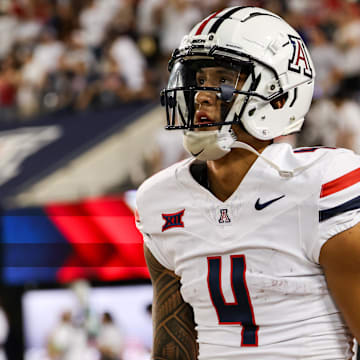 Aug 31, 2024; Tucson, Arizona, USA; Arizona Wildcats wide receiver Tetairoa McMillan (4) looks at scoreboard during third quarter at Arizona Stadium. Mandatory Credit: Aryanna Frank-Imagn Images