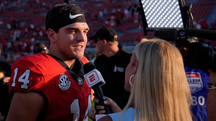 Georgia quarterback Gunner Stockton (14) speaks with the media after a NCAA college football game against Marshall in Athens, Ga., on Saturday, August. 30, 2025. Georgia won 45-7.