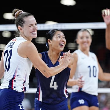 Aug 4, 2024; Paris, France; United States outside hitter Kelsey Robinson (23) and libero Justine Wong-Orantes (4) reacts after a play against France in a pool A match during the Paris 2024 Olympic Summer Games at South Paris Arena 1.