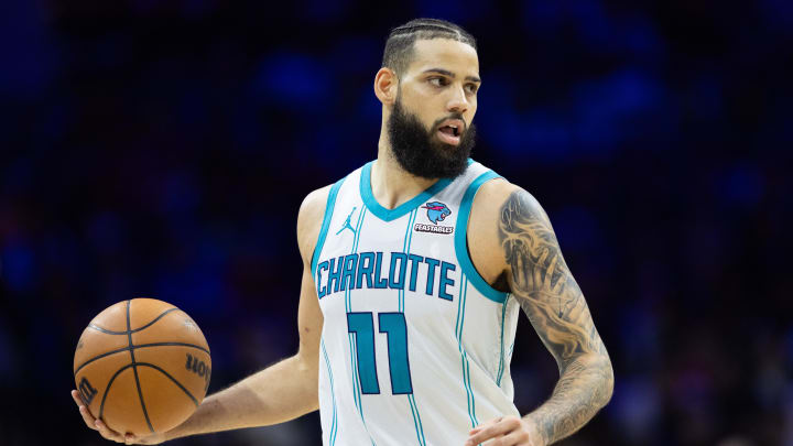 Mar 1, 2024; Philadelphia, Pennsylvania, USA; Charlotte Hornets forward Cody Martin (11) controls the ball against the Philadelphia 76ers during the fourth quarter at Wells Fargo Center. Mandatory Credit: Bill Streicher-USA TODAY Sports