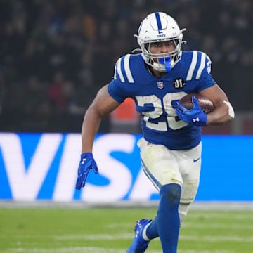Nov 9, 2025; Berlin, Germany; Indianapolis Colts running back Jonathan Taylor (28) runs the ball against the Atlanta Falcons during the NFL Berlin Game at Olympic Stadium. 