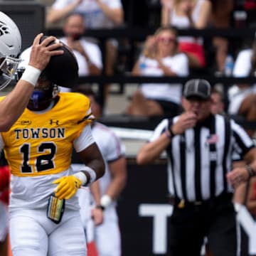 Cincinnati Bearcats quarterback Brendan Sorsby (2) scores a touchdown in the first quarter of the College Football game between the Cincinnati Bearcats and the Towson Tigers at Nippert Stadium in Cincinnati on Saturday, Aug. 31, 2024.