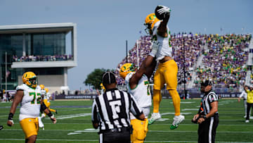Sep 13, 2025; Evanston, Illinois, USA; Oregon Ducks running back Jayden Limar (27) celebrates his touchdown against the Northwestern Wildcats during the first half at Northwestern Medicine Field at Martin Stadium. Mandatory Credit: David Banks-Imagn Images