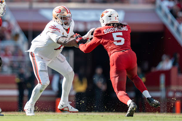 September 21, 2025; Santa Clara, California, USA; San Francisco 49ers offensive tackle Trent Williams (71) blocks Arizona Car