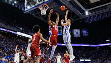 Jan 18, 2025; Lexington, Kentucky, USA; Kentucky Wildcats guard Koby Brea (4) shoots the ball over Alabama Crimson Tide forward Mouhamed Dioubate (10) during the second half at Rupp Arena at Central Bank Center. Mandatory Credit: Jordan Prather-Imagn Images