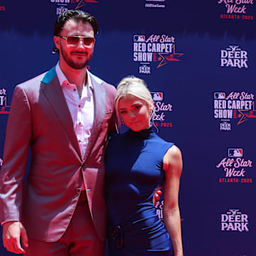 Jul 15, 2025; Atlanta, GA, USA; National League pitcher Paul Skenes (30) of the Pittsburgh Pirates and social media influencer Livvy Dunne pose for a photo on the red carpet before the 2025 MLB All Star Game at Truist Park. Mandatory Credit: Brett Davis-Imagn Images