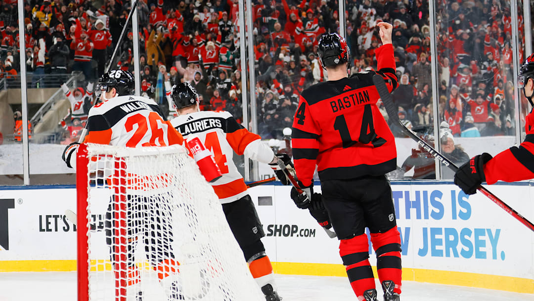 Nathan Bastian (Former Devils forward #14) doing the "Tommy DeVito" celebration during the 2024 Navy Federal Credit Union Stadium Series at MetLife Stadium