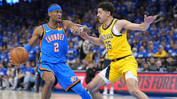  Oklahoma City Thunder guard Shai Gilgeous-Alexander dribbles the ball against Indiana Pacers guard Ben Sheppard during the second half during game two of the 2025 NBA Finals at Paycom Center. 