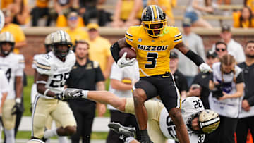 Luther Burden III is hoping to shake up the NFL Offensive Rookie of the Year race the same way he shook off this would-be tackler
