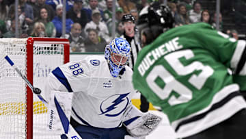 Mar 20, 2025; Dallas, Texas, USA; Tampa Bay Lightning goaltender Andrei Vasilevskiy (88) makes a save on a shot by Dallas Stars center Matt Duchene (95) during the second period at the American Airlines Center. Mandatory Credit: Jerome Miron-Imagn Images