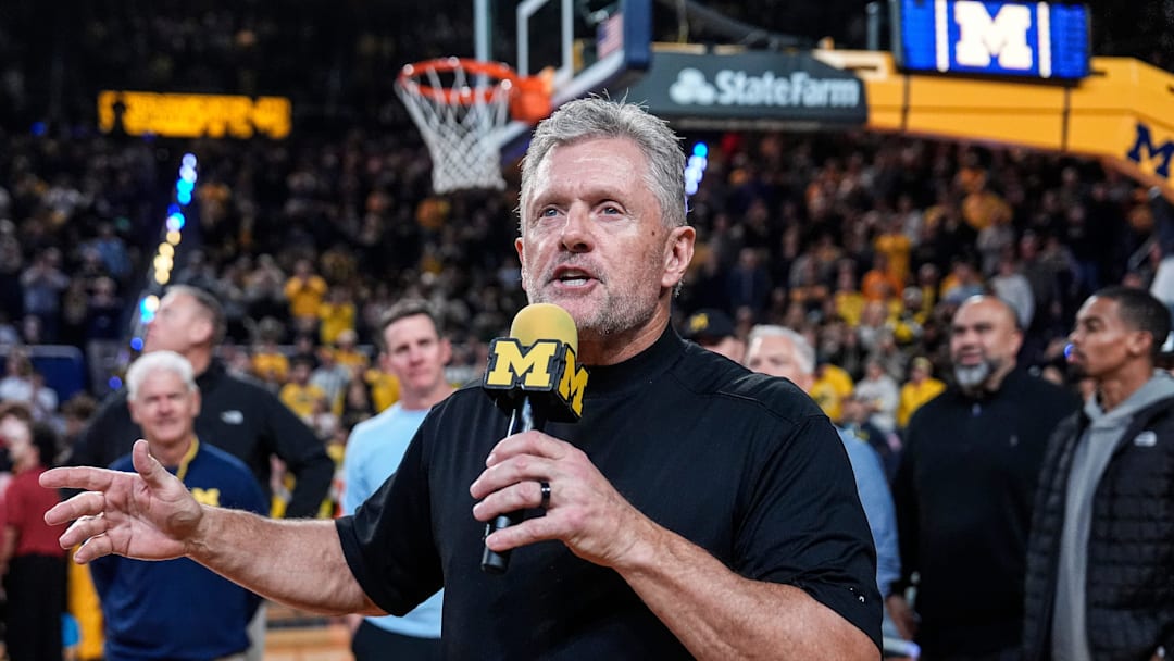 Michigan football head coach Kyle Whittingham speaks as he is being introduced on the floor during the first half between Michigan and USC at Crisler Center in Ann Arbor on Friday, Jan. 2, 2026.