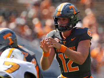 Tennessee quarterback Jake Merklinger (12) waits for the snap during a football game between Tennessee and Chattanooga at Neyland Stadium in Knoxville, Tenn., on Saturday, August 31, 2024.