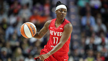 Sep 25, 2024; Uncasville, Connecticut, USA; Indiana Fever guard Erica Wheeler (17) drives to the basket during the first half against the Connecticut Sun during game two of the first round of the 2024 WNBA Playoffs at Mohegan Sun Arena. Mandatory Credit: Paul Rutherford-Imagn Images
