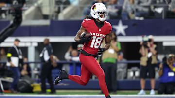 Nov 3, 2025; Arlington, Texas, USA; Arizona Cardinals wide receiver Marvin Harrison Jr. (18) scores a touchdown against the Dallas Cowboys in the first half at AT&T Stadium. Mandatory Credit: Kevin Jairaj-Imagn Images