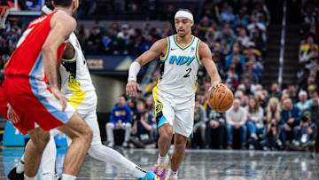 Feb 20, 2025; Indianapolis, Indiana, USA; Indiana Pacers guard Andrew Nembhard (2) dribbles the ball  in the second half against the Memphis Grizzlies at Gainbridge Fieldhouse. Mandatory Credit: Trevor Ruszkowski-Imagn Images