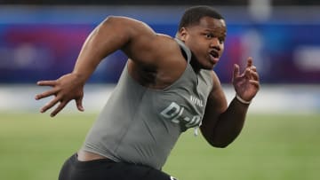 Feb 29, 2024; Indianapolis, IN, USA; Clemson defensive lineman Tyler Davis (DL03) works out during the 2024 NFL Combine at Lucas Oil Stadium. 