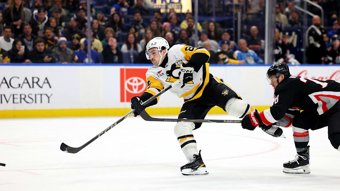 Feb 5, 2026; Buffalo, New York, USA;  Pittsburgh Penguins right wing Avery Hayes (85) takes a shot on goal and scores his first career NHL goal during the first period against the Buffalo Sabres at KeyBank Center. Mandatory Credit: Timothy T. Ludwig-Imagn Images