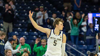 Dec 2, 2025; South Bend, Indiana, USA; Notre Dame Fighting Irish guard Cole Certa (5) celebrates making a 3-point shot during the second half at Purcell Pavilion at the Joyce Center. Mandatory Credit: Michael Caterina-Imagn Images
