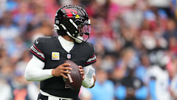 Oct 5, 2025; Glendale, Arizona, USA; Arizona Cardinals quarterback Kyler Murray (1) looks to throw against the Tennessee Titans during the second quarter at State Farm Stadium. 