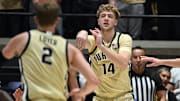 Purdue Boilermakers guard Jack Benter (14) passes the ball