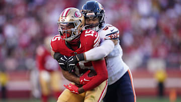 Bears linebacker T.J. Edwards wraps up 49ers receiver Jauan Jennings in last year's game on the coast. They match up again in Week 17 in 2025, same location.