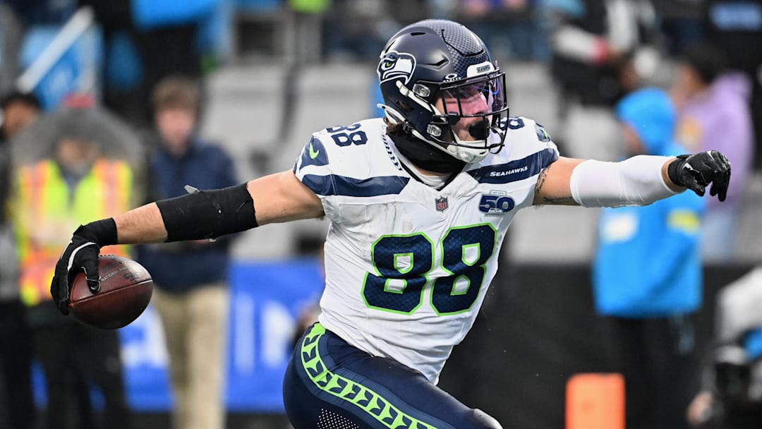 Seattle Seahawks tight end AJ Barner (88) reacts after catching a seventeen-yard touchdown pass thrown by quarterback Sam Darnold (not pictured) against the Carolina Panthers during the third quarter at Bank of America Stadium. 